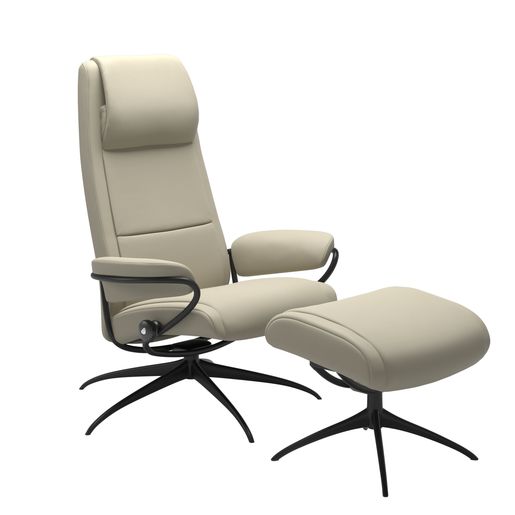 Stressless® Paris Star recliner with high back and footstool