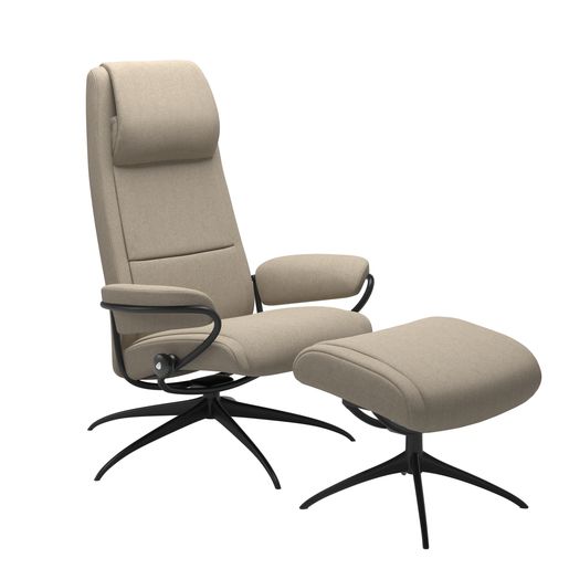 Stressless® Paris Star recliner with high back and footstool